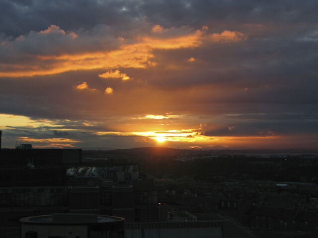 Sun's going down over Edinburgh